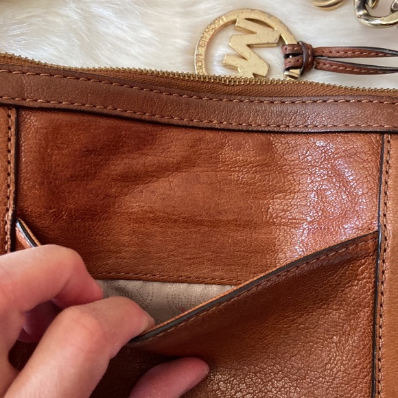 Michael Kors brown crossbody bag with gold tone hardware. - Picture 7 of 10